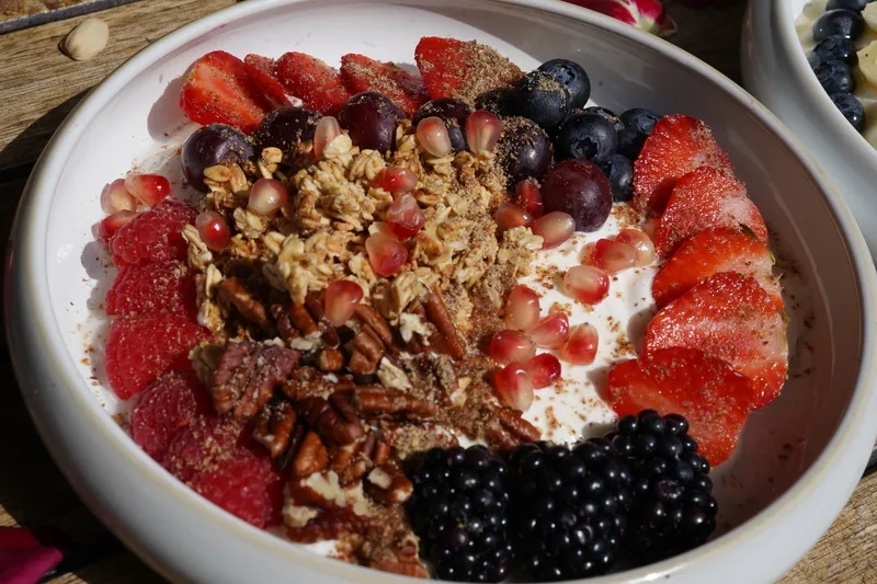 Fresh berry, granola and yoghurt brunch bowl