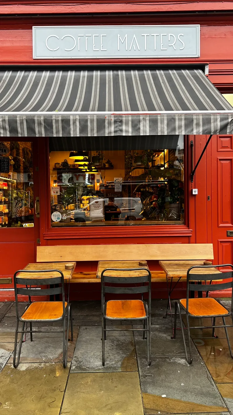 Close-up of the cafe entrance and outdoor seating